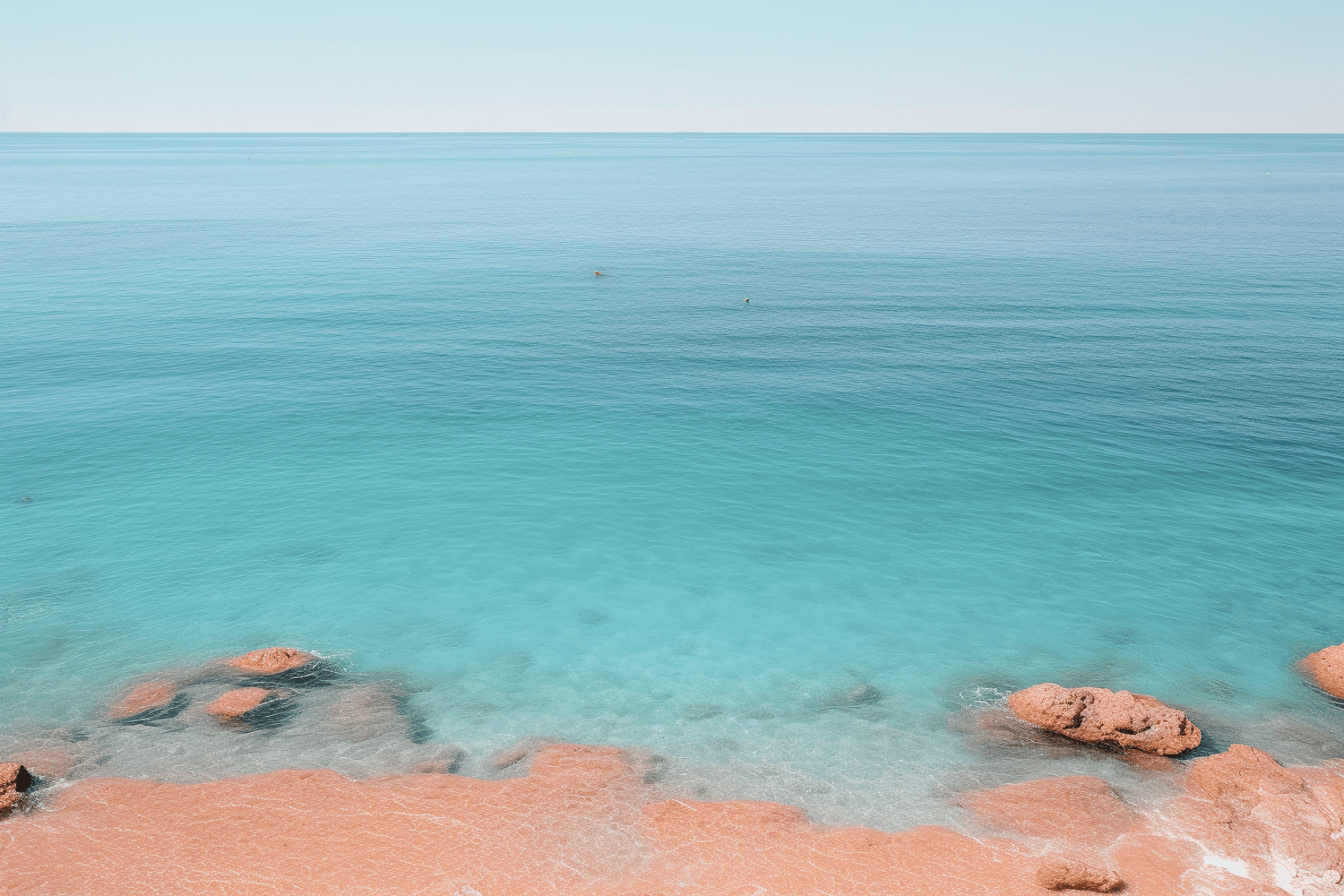 Turquoise water and soft sand on a quiet island beach